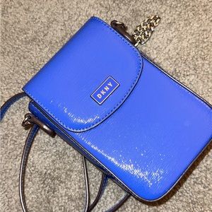 Small DKNY purse blue condition is perfect like new